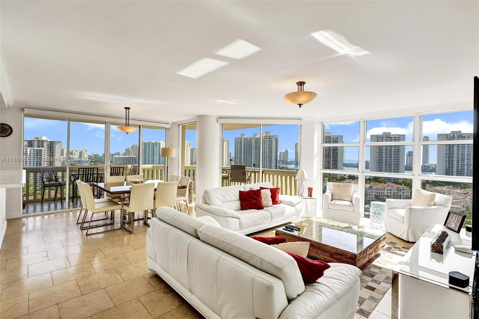 LIVE THE 5 STAR RESORT LIFESTYLE ON WILLIAMS ISLAND. MUST SEE THREE BEDROOM, TWO & HALF BATH W/ DOUBLE DOOR ENTRY, OPEN KITCHEN CONCEPT, MANY UPGRADES INCLUDING ELECTRIC SHADES THROUGHOUT. SPECTACULAR PANORAMIC VIEWS OF THE OCEAN, INTRACOSTAL, LAKE & CITY. LOCATED ON A HIGH FLOOR IN THE 1000 BLDG WITH NO SPECIAL ASSESSMENTS & OVER $10M IN RESERVES! READY TO MOVE RIGHT IN. FURNITURE NEGOTIABLE. THE WILLIAMS ISLAND COMMUNITY OFFERS A COUNTRY CLUB RESORT LIFESTYLE WITH 27,000 SQFT FULL SERVICE EUROPEAN SPA W/ INDOOR POOL, 15 CLAY TENNIS COURTS WITH TEACHING PROS, 4 PICKELBALL COURTS, 2 PADEL COURTS, CLUB EVENTS, PARTIES, DOG PARK, CHILDRENS PLAYGROUND, TWO RESTAURANTS, OUTDOOR POOL W/ RESTAURANT, DEEP WATER MARINAS, SCENIC WALKWAYS ALONG INTRACOASTAL WATERWAYS, GUARD GATE AND MUCH MORE.