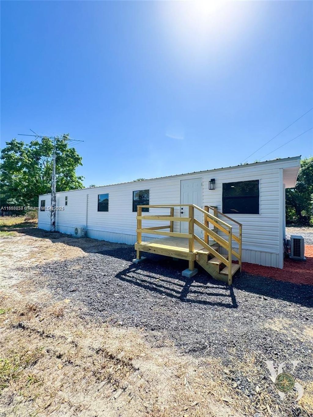 Photo of 5121 Pioneer 18th St, Clewiston, FL 33440 (MLS # A11883253)