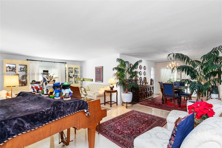 This spacious 5-bedroom, 4-bath residence with a private 1-bedroom guest apartment with a kitchen offering the perfect blend of flexibility, comfort, and opportunity. Designed with a desirable split-bedroom floor plan, the home provides privacy for family and guests alike—ideal for multi-generational living or accommodation with live-in help. Impact windows offer peace of mind and energy efficiency, while thoughtful updates over the years ensure the property is truly move-in ready. A welcoming covered entryway, two-car garage, and expansive half-acre lot set the stage for gracious living, with a sparkling pool creating the ultimate backyard retreat. While beautifully maintained, the home also presents the opportunity for modern updates to match your personal style, making it an exceptional investment in both lifestyle and value.