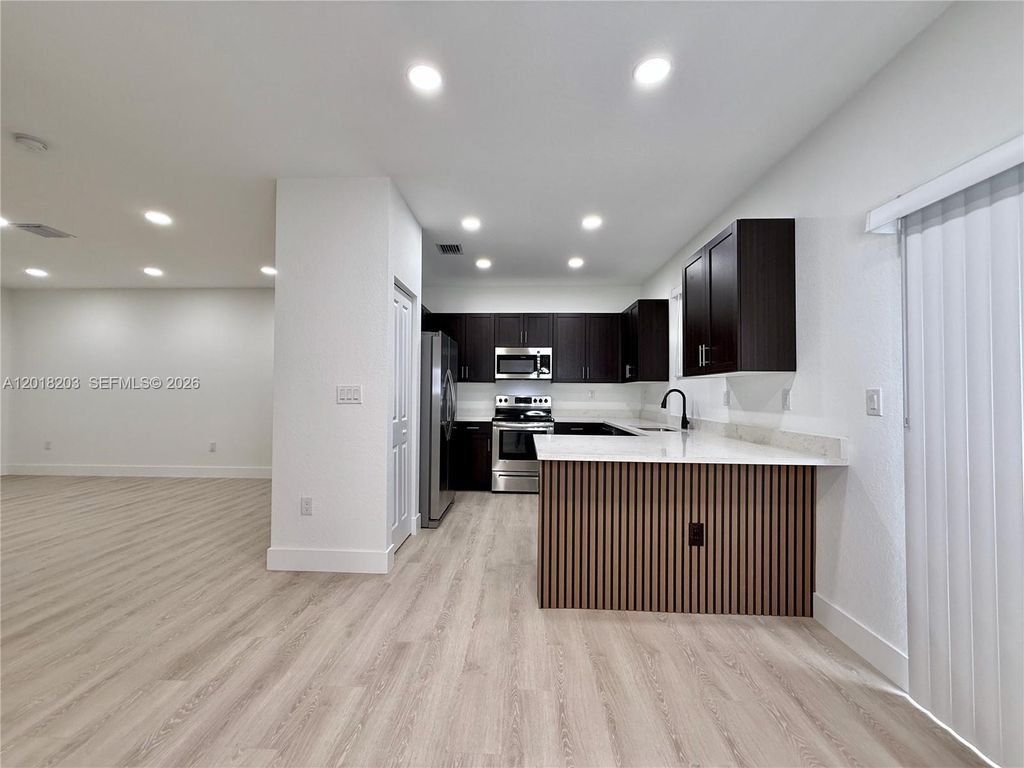 Photo of 5408 SW 14th Ct, North Lauderdale, FL 33068 (MLS # A12018203)