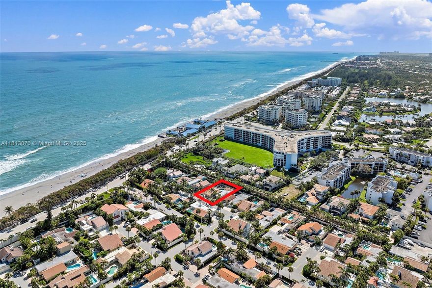 Steps from the sand. Center of the vibe. Located in Jupiter's gated Ocean Walk community, this 3-bed + office, 3.5-bath beach retreat serves up a rare blend of privacy, style, and surfside living. All bedrooms are ensuite, giving every guest or family member a private oasis. Recent updates include a 2021 roof, impact windows, Subzero appliances, and a 2024 pool heater. Enjoy breezy mornings in your remodeled travertine courtyard or take a 2-minute walk to dip your toes in the Atlantic. The open layout is perfect for entertaining, while the saltwater pool, volume ceilings, and partial impact glass make everyday living feel like a vacation. Tucked inside a pet-friendly, walkable enclave, this home is for those who want Florida luxury without the fuss.