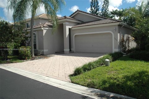 Photo of 1095 NW 117th Ave, Coral Springs, FL 33071 (MLS # A11856808)