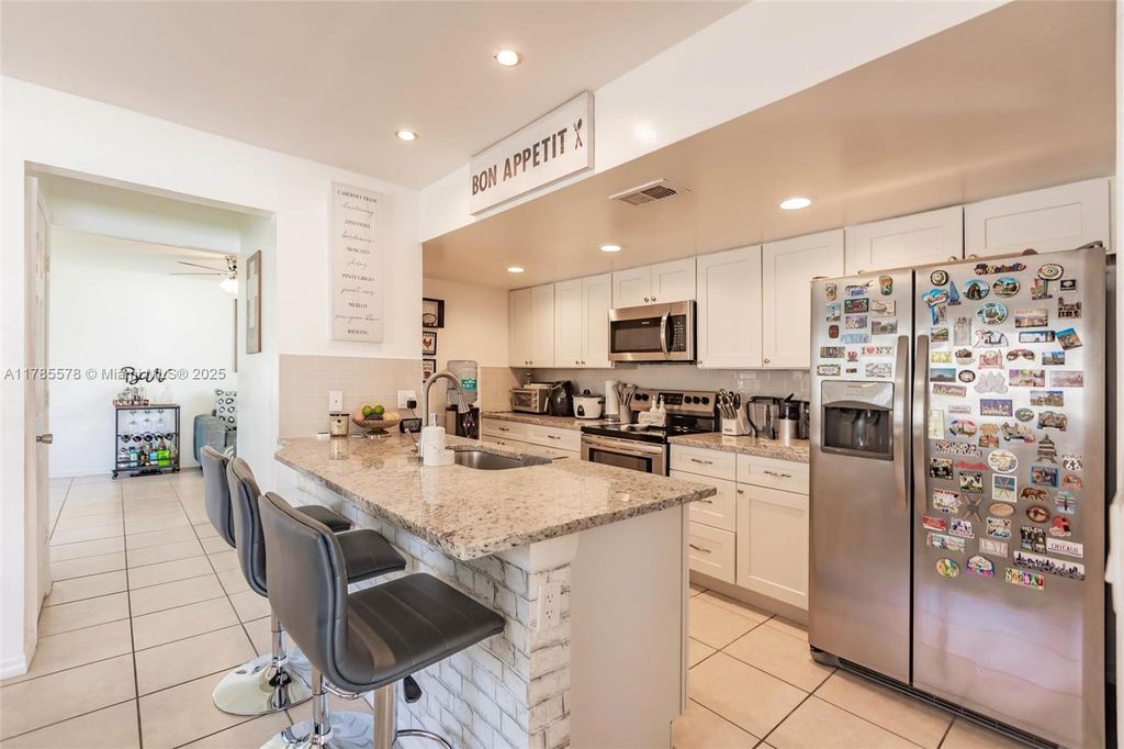 Photo of 1420 Dandelion Ln, West Palm Beach, FL 33415 (MLS # A11785578)
