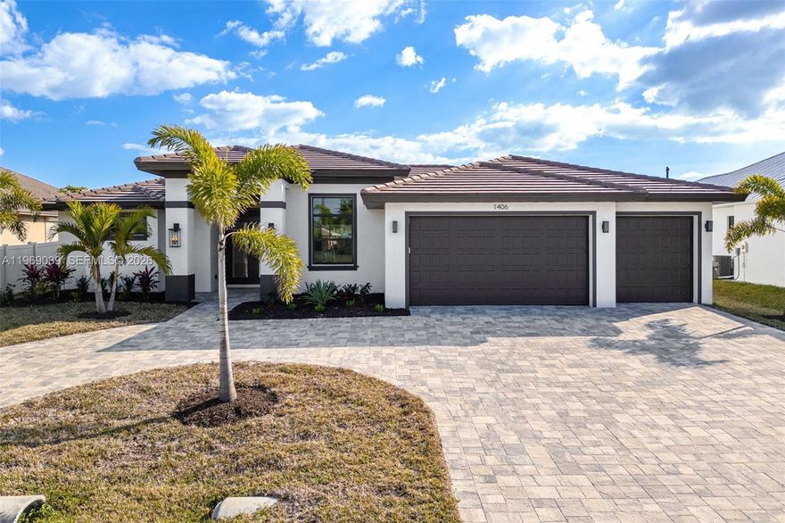 Welcome to a stunning new construction home in the heart of Southwest Cape Coral, just minutes from Cape Harbor, Tarpon Point, waterfront dining, boutique shopping, and all the amenities that make this one of Southwest Florida’s most desirable boating communities. A circular driveway and spacious three-car garage set the tone, leading to a light-filled foyer that opens into an expansive family room with pocket sliders for seamless indoor-outdoor living. The open floor plan is ideal for everyday comfort and entertaining, anchored by a showpiece kitchen with a massive island, custom shelving, and sleek finishes flowing effortlessly into the dining and living areas. The primary suite is a private retreat with sliders to the pool area, custom lighting, generous closets, and a spa-inspired bath featuring a soaking tub and oversized walk-in shower. Guest bedrooms are generously sized, with one offering easy access to the pool bath. Outside, a custom pool and spa overlook a wide canal, complemented by an expansive lanai and outdoor kitchen perfect for entertaining. With Gulf access just minutes away, room for a custom dock or tiki hut, hurricane-impact windows and doors, tile throughout, and luxury finishes throughout, this home combines thoughtful design with the ultimate Southwest Florida lifestyle.