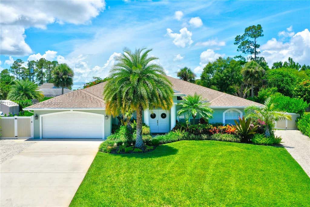 Photo of 2249 SW Crocus Ln, Port Saint Lucie, FL 34953 (MLS # A11398311)