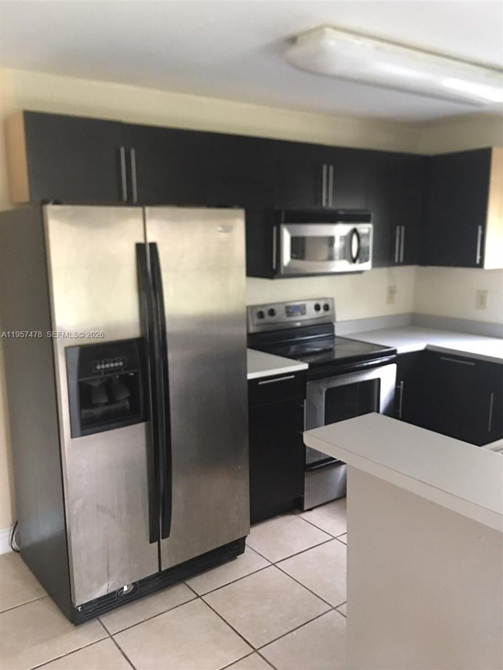 Photo of 4090 NW 88th Ave #314, Sunrise, FL 33351 (MLS # A11957478)