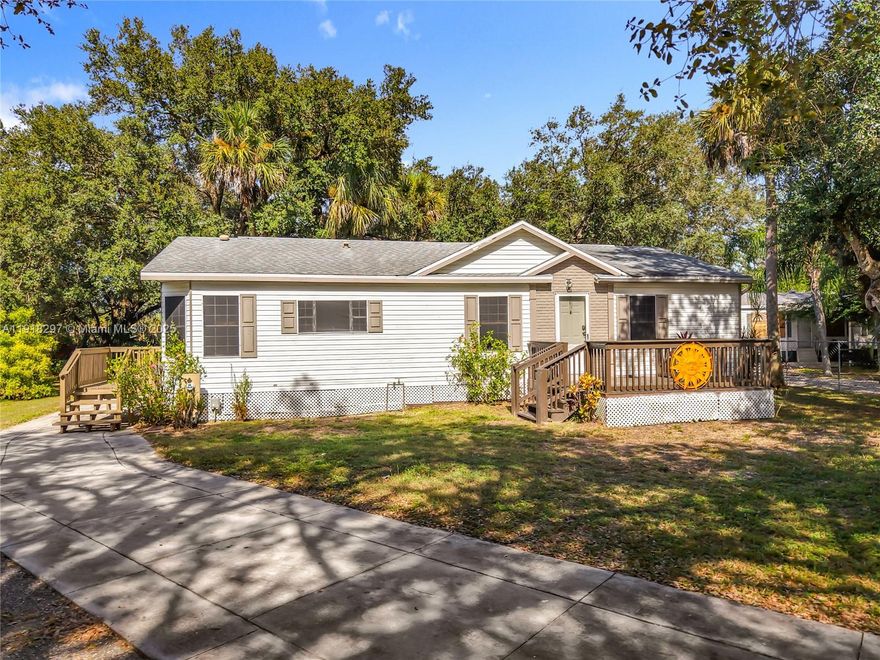 Updated, affordable, and move -in ready! This 3BR/2BA, 1,294 sq ft home sits on a quiet oak-covered cul-de-sac and has been beautifully refreshed. New shingle roof (2021), all-new luxury vinyl flooring, fresh interior paint, custom wood window treatments, and new remote-control ceiling fans throughout. The bright, front-facing dine-in kitchen features stainless steel appliances and a large pantry. Spacious primary suite with a fully remodeled bath--granite counters and double vanity. Guest bath also remodeled with a stylish walk-in shower. Relax on your family-sized, rocking-chair front porch or enjoy the private, oak-filled backyard. Peaceful setting but close to everything--schools, shopping, SR-80 & SR-29. A clean, updated, well-priced home that's hard to beat!