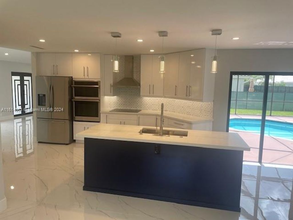 Photo of 4302 NW 54th St, Coconut Creek, FL 33073 (MLS # A11614583)