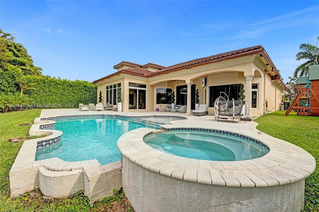 Photo of 10291 Sweet Bay St, Plantation, FL 33324 (MLS # A11984438)