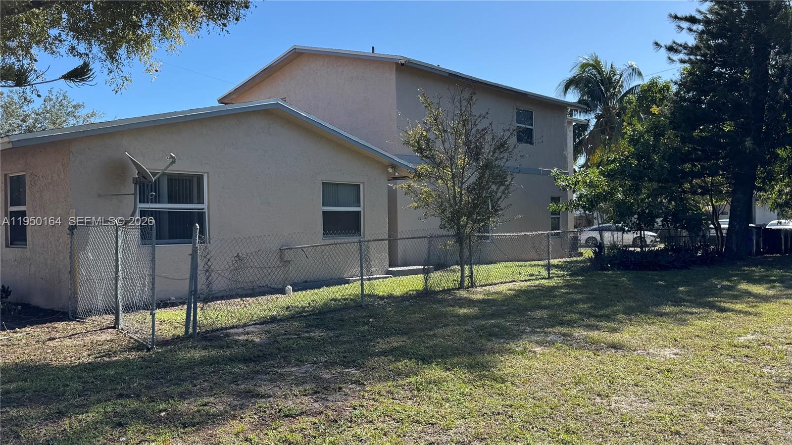 View photos, virtual tours, details... 2099 NW 26th Ave