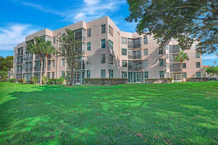 Beautiful 3/2 condo with serene lake and golf course views in Pine Island Ridge, a private country club community. Updated kitchen has brand-new stainless appliances and a convenient breakfast nook. A/C 3 years old, washer/dryer/water heater 5 years old. Split floor plan, walk-in closet in master. Enclosed screened balcony. Reserved parking with plenty of guest parking. Country club membership includes 2 restaurants, sports bar, 3 pools, gym, sauna, golf, tennis, pickleball, basketball, BBQ and playground. Building has new roof in 2024. All assessments have been paid. All ages welcome. One pet  <20 lbs. Rentals OK after 1 year. Central but quiet location close to shopping, dining, top schools and major highways. 15 minutes to Fort Lauderdale/Hollywood International Airport (FLL).