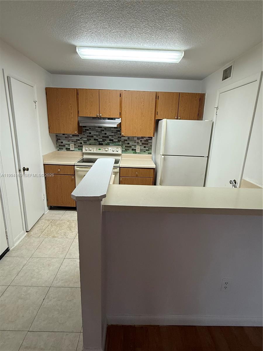 PALM AIRE GARDENS CONDO - Residential Lease
