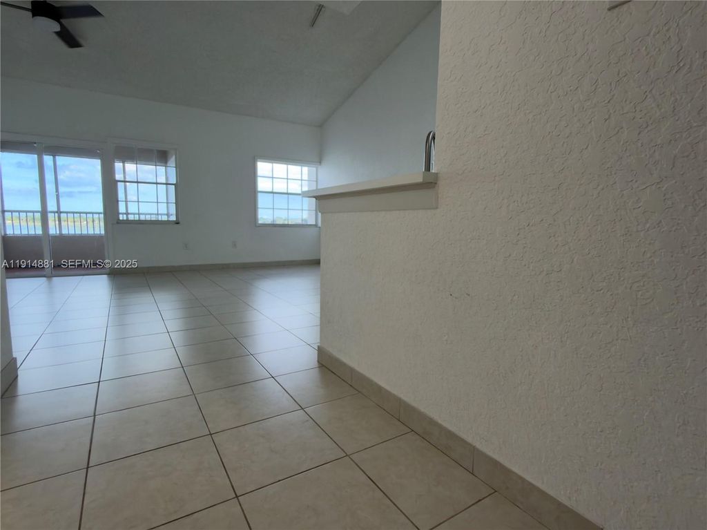 Photo of 2803 N Oakland Forest Dr #304, Oakland Park, FL 33309 (MLS # A11914881)