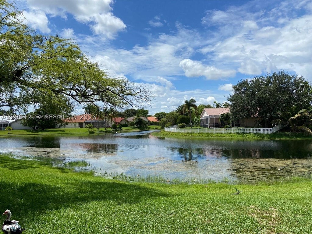 Photo of 450 W Palm Circle #202, Pembroke Pines, FL 33025 (MLS # A12091223)