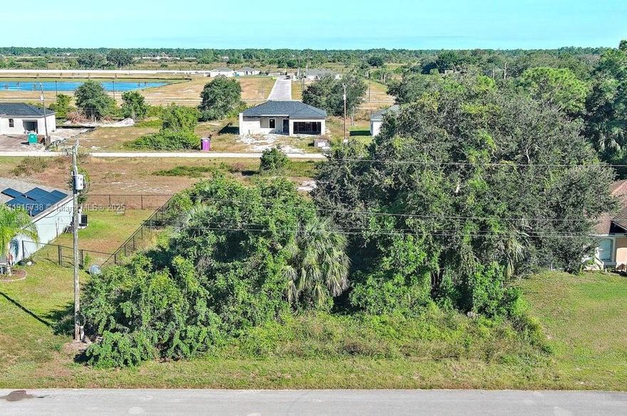 Explore the possibilities of this 0.24-acre vacant lot in Lehigh Acres! Located in a peaceful, fast-growing neighborhood, this spacious property is ideal for building your custom home or making an investment in a developing area. Enjoy tranquil surroundings while being just minutes from schools, shopping, restaurants, and major highways for convenient commuting. With plenty of space for a house, outdoor areas, and potential upgrades, this lot offers countless opportunities. Seize the chance to own a prime piece of Florida real estate in an emerging community!