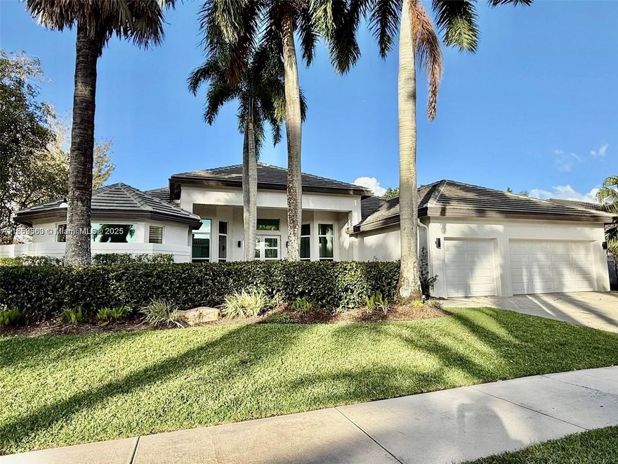 Live the ultimate Weston Hills lifestyle in this impeccably updated home with panoramic views of the Players Course. Set in an exclusive gated community, it offers a NEW roof, full-impact windows/doors, and refined finishes throughout. The owner’s suite is a serene escape with dual walk-in closets and a luxurious renovated bath featuring porcelain accents, freestanding tub, and walk-in shower. A chef’s dream kitchen boasts Miele cooktop, Subzero refrigerator, and double wall ovens. Secondary bedrooms feature new flooring and generous closets. Outside, a newly redesigned travertine patio frames the resurfaced heated saltwater pool and spa—your private resort overlooking the golf course. Truly move-in ready!