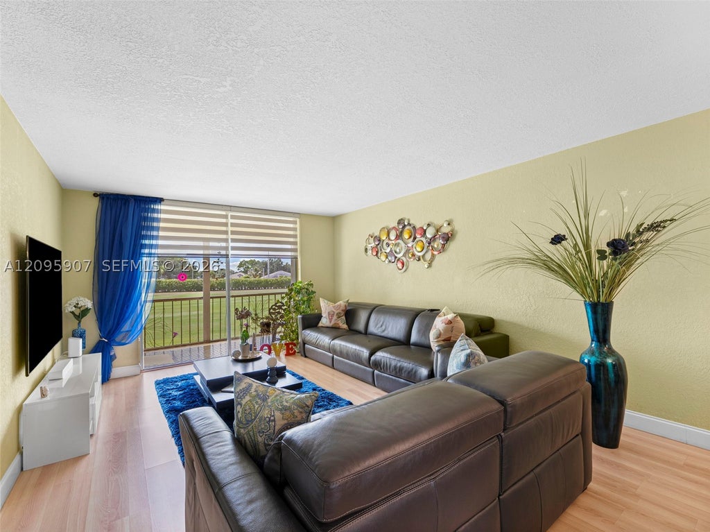 Photo of 9820 S Hollybrook Lake Dr #208, Pembroke Pines, FL 33025 (MLS # A12095907)