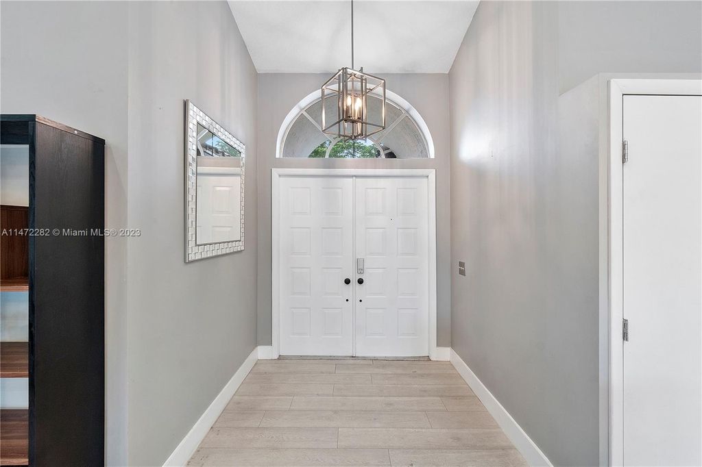 Photo of 9251 NW 42nd Ct, Coral Springs, FL 33065 (MLS # A11472282)