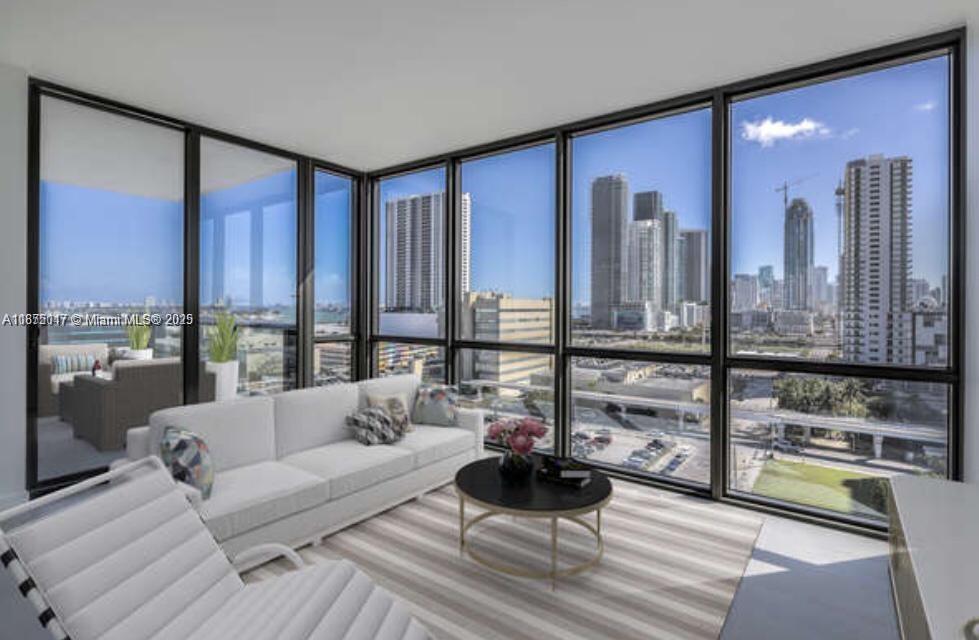 Enchanting 2/2 Corner with breathtaking views of Miami Urban skyline & Biscayne Bay. Porcelain Floors, Italian Kitchen Cabinets with SS appliances. Window treatments. Location, location, location!!! Canvas is located in the heart of the Miami's Arts and Entertainment District. Minutes away to Wynwood, Design District, Midtown, Brickell, South Beach, and the Miami Airport. Canvas is surrounded by shops, a variety of restaurants and entertainment venues. Canvas State of the art amenities: 3 pool: Sunrise, Sunset and rooftop, theater, indoor/outdoor yoga garden, fitness center, glass-enclosed racquetball court, sauna, sundeck, valet parking, Concierge and much more. Immediate occupancy. Very easy to show/2 FREE PARKING/FAST ASSOCIATION APPROVAL