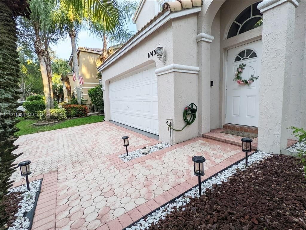 Photo of 11454 NW 48th Ct #11454, Coral Springs, FL 33076 (MLS # A11791108)