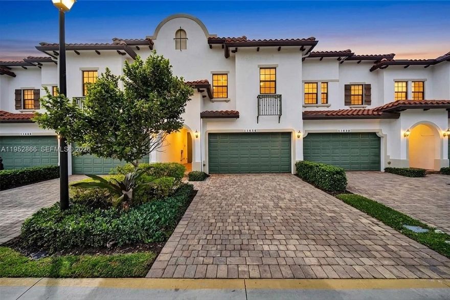 Exclusive move-in ready, WATERFRONT, 2018-built (LIKE-NEW), 2,133 sqft Townhome, with HIGH CEILINGS in the gated Raintree community (with beautiful, lush landscaping)! |~| The Vallejo model is LARGE, has 3 Bedrooms (potential 4th), 2.5 Bathrooms, an upstairs Den, and a 2-car GARAGE (space for 4+ cars). |~| The open-concept layout flows into a sleek Kitchen (with a big Island, Pantry, and a 3-Stage Reverse Osmosis Water Filter), Automatic Blinds (in the main living areas and primary bedroom), and fully Impact Windows and Doors throughout. |~| Primary Suite features 2 WALK-IN CLOSETS, Double Sinks, and a Private Balcony overlooking the water. |~| Raintree is pet-friendly and features resort-style amenities; including a pool (with loungers), a fully-stocked & updated fitness center (with locker rooms), responsive on-site management, an event space, and a playground (in-progress). |~| Centrally located just minutes from dining, malls, great schools, and major highways.