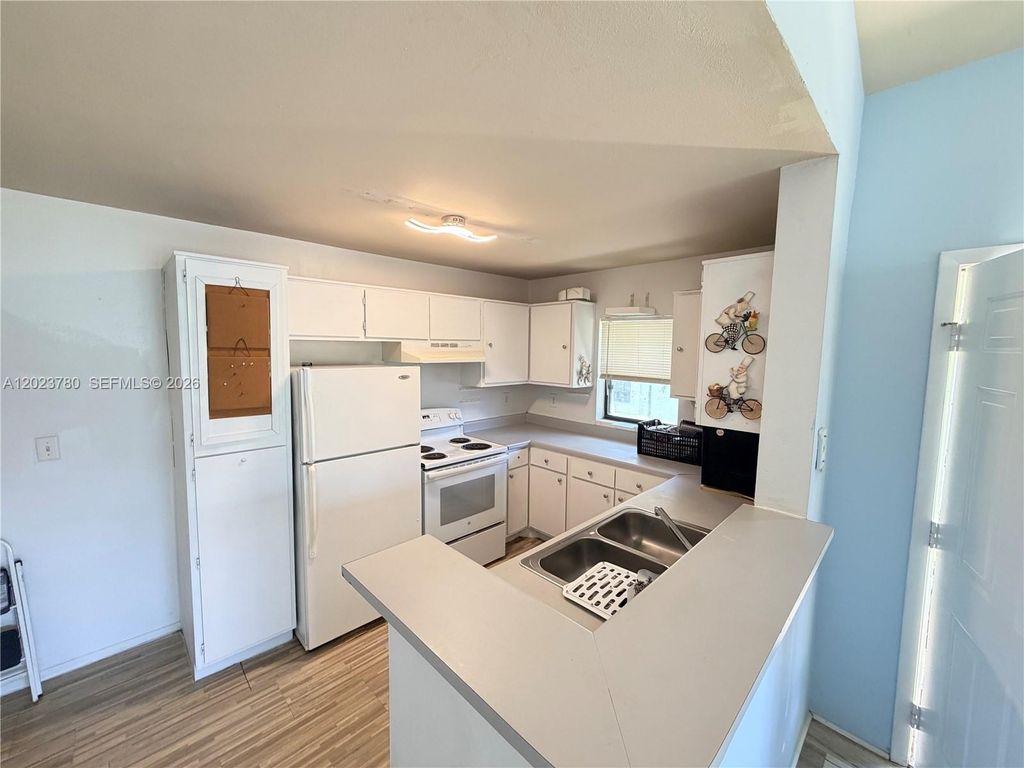 Photo of 3968 NW 87th Ave #3968, Sunrise, FL 33351 (MLS # A12023780)