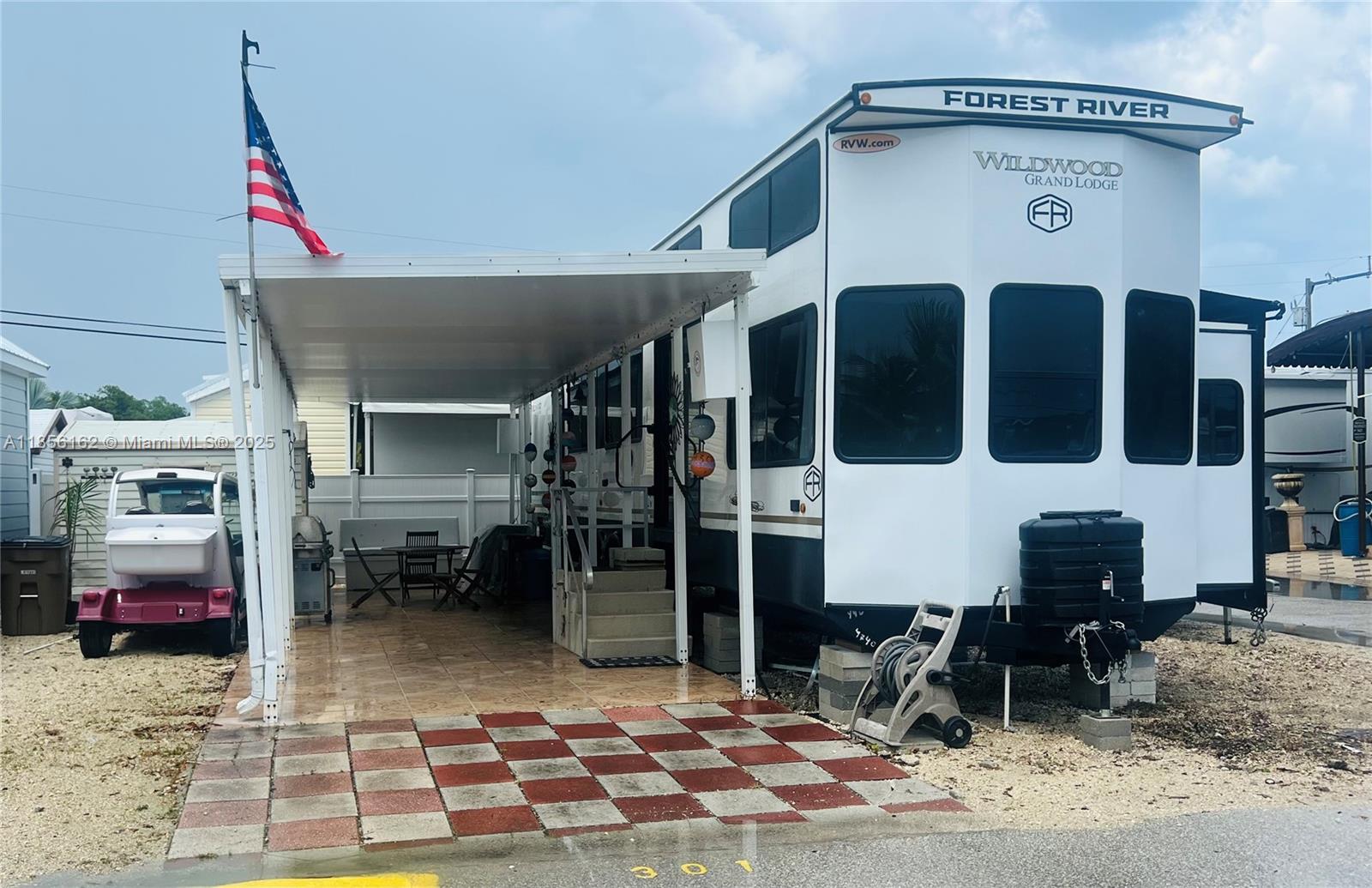 **Brand new** 2025 Forest River RV in OVERSIZED Corner Lot (45’ x 50’ Deep), w/ 43’ Dock- 15k Lb Boat Lift. 3 bedrooms, 1.5 bathrooms (2 full size mattresses, 1 King mattress, 1 queen mattress, & sleeper sofa Sectional). Aluminum Insulated Roof and Shed for storage. Quartz Waterfall Countertop, dimmable Interior LED Blade Lighting, SS appliances: Refrigerator w/Ice Maker, Gas Range, Gas Oven, and microwave. Kitchen Sink with Soap Dispenser & Waterfall Feature. Soft-Close Drawers. Vinyl Flooring Throughout. 2 Electric Fireplaces. 55” Hideaway Lift TV in Living Room. JBL Interior/Exterior Speaker System. Motorized Shades in Living Area, Manual Shades in Bedrooms. Central Vacuum System. On-Demand Tankless Water Heater. (3) 5K BTU A/C Units w/ separate Thermostats. Golf cart is negotiable!!