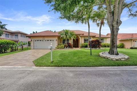 Photo of 8269 NW 40th Ct, Coral Springs, FL 33065 (MLS # A12032290)