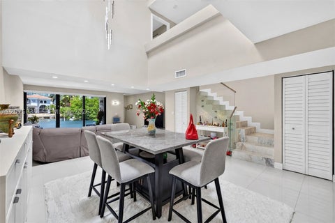 Photo of 203 Poinciana Dr #103, Sunny Isles Beach, FL 33160 (MLS # A12075035)