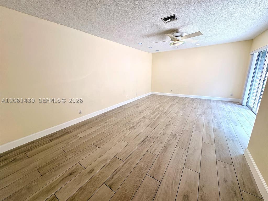 Photo of 11196 Longboat Dr, Cooper City, FL 33026 (MLS # A12061439)
