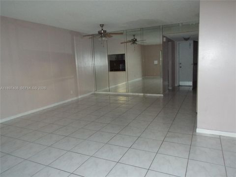 Photo of 410 SE 2nd St #102, Hallandale Beach, FL 33009 (MLS # A11897408)