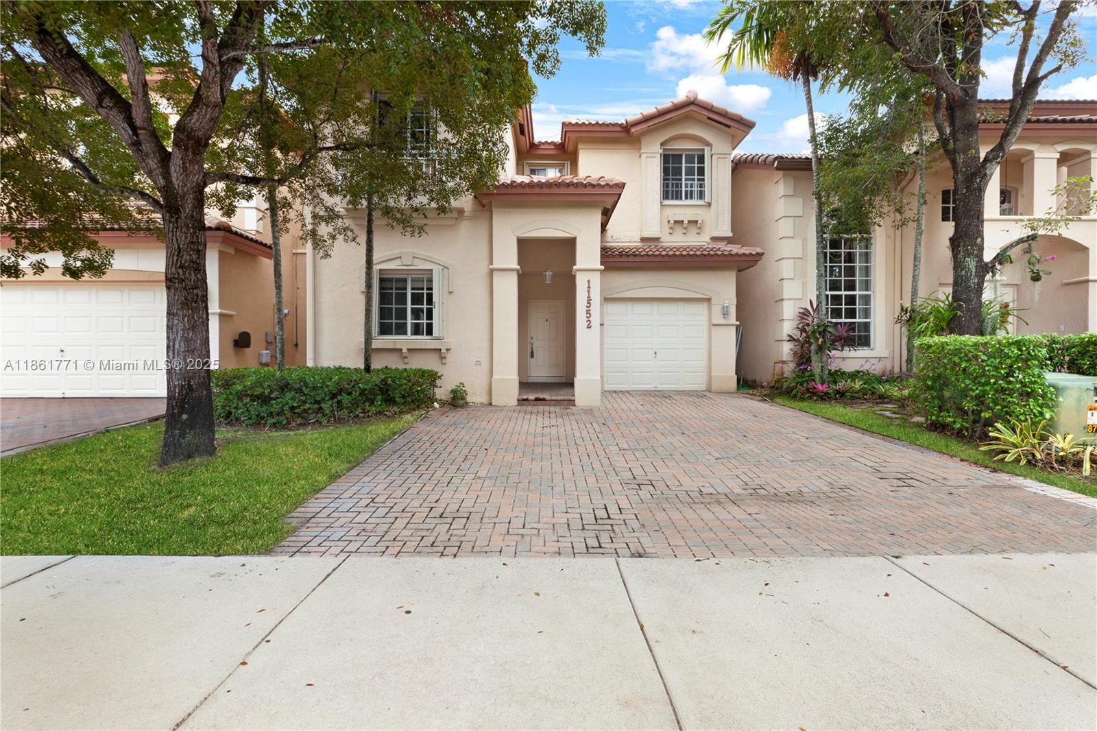 Looking for a place in Doral that: has water views, a gated community, and a great price? If that sounds like you, you have just found your next place to call 'HOME!!'. This 4 bedroom, 3 bathroom two-story home has everything on your list! Located in Doral Isles' Barbados neighborhood, this home features endless lake views, a spacious backyard patio, and one bedroom and full bath on the first floor. Freshly painted - both interior & exterior! Extremely spacious (over 2,300sf!) home that is ready for you to make it your own!