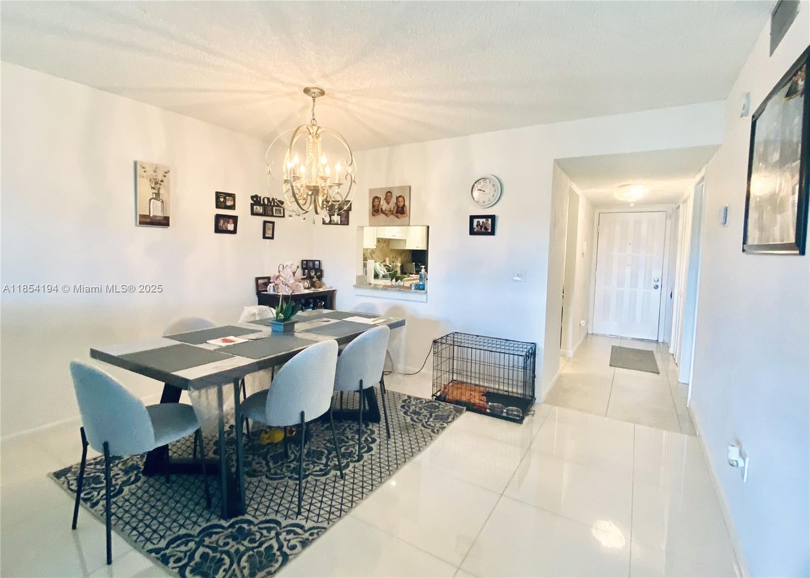 FIRST FLOOR UNIT FEATURING A BEAUTIFUL SPACIOUS 2/2 CONDO, REMODELED KITCHEN WITH WHITE SHAKER CABINETS GRANITE COUNTERTOP & STAINLESS STEELE APPLIANCES**24'' X 24'' PORCELINE TILE THROUGHOUT**NEW TRANE A/C INSTALLED 2023**NEW RHEEM HOT WATER HEATER INSTALLED 2023**CONDO HAS INTERIOR WASHER & DRYER **REAR PATIO OVERLOOKS LAKE**WALK OUT YOUR BACK PATIO DOOR TO THE POOL ONLY 50 YARDS AWAY**CONDO FEE INCLUDES ROOF, WATER, DIGITAL CABLE & HBO**THIS UNIT IS A MUST SEE!!