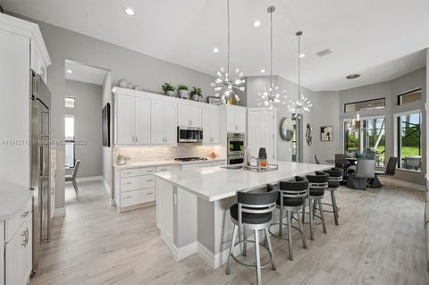 Photo of 12065 N Kalmar Cir, Parkland, FL 33076 (MLS # A11912115)