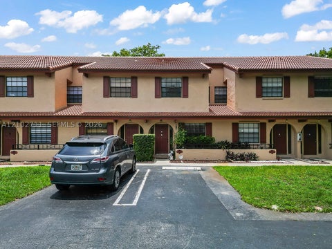 Photo of 10942 W Sample Rd, Coral Springs, FL 33065 (MLS # A12102711)