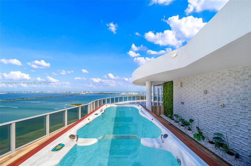 This incredible Mansion In The Sky offers nearly 8,000 total sf with its own private rooftop! Seller Financing Is Available. Two private elevators take you all the way up to your immaculate Penthouse in the Heart of Miami. Step into your private foyer & discover the double doors opening up to your 3-story mansion with 5-bedrooms, 6.5 bathrooms + Den + Staff Quarters & over 3,000 SF of outdoor space on your private roof-top terrace, summer kitchen & Jacuzzi-pool to enjoy everyday. This spacious Penthouse is ready for you to create your own paradise in Miami's vibrant Arts & Entertainment District. All in the heart of the city, just minutes from the best that Miami has to offer: Design District, Midtown, Wynwood, Brickell, Miami Beach, Miami Opera, Theater, Arena and Art & Science Museums.