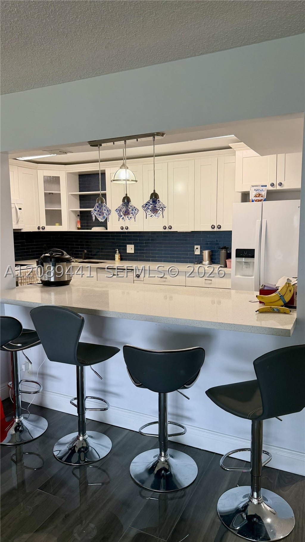 Photo of 2681 S Course Dr #406, Pompano Beach, FL 33069 (MLS # A12089441)