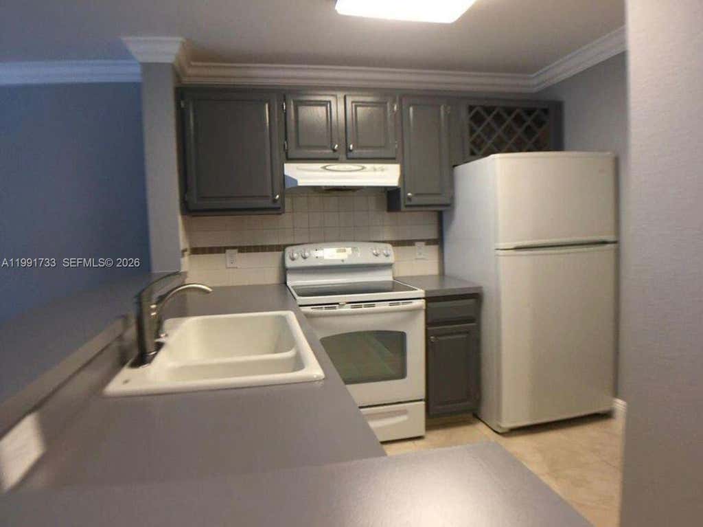 Photo of 1780 Palm Cove #6-202, Delray Beach, FL 33445 (MLS # A11991733)