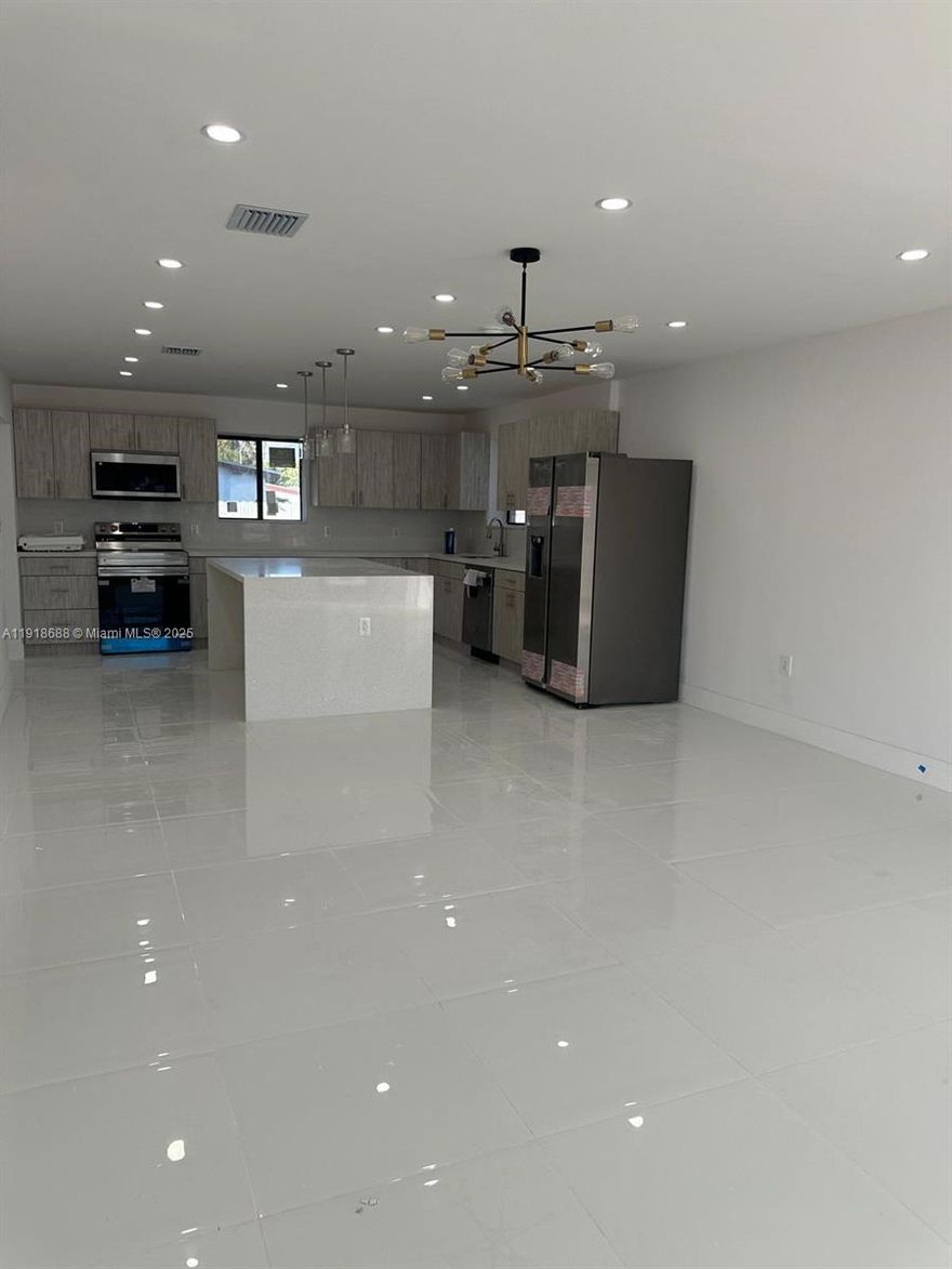 Discover this beautifully remodeled Miami Gardens residence featuring 4 bedrooms and 4 bathrooms, offering a perfect blend of quality, design, and comfort. Although not classified as New Construction, the home has undergone a complete, full-scale renovation, entirely done with permits, providing peace of mind and long-term value. Major upgrades include new plumbing with permit, new electrical system with permit, new permitted roofing, and a new air-conditioning system installed with permit. Every improvement was completed according to current county standards, ensuring safety, efficiency, and durability.

Inside, the home showcases a modern open-concept layout with stylish finishes and bright, spacious living areas. The fully renovated kitchen features contemporary cabinetry, quality countertops, and updated appliances. All four bedrooms offer comfort and privacy, while the four bathrooms display sophisticated design and carefully selected materials. The exterior provides a generous backyard with excellent potential for outdoor living, entertainment, or future enhancements. Located in a well-established residential neighborhood close to schools, shopping, and major highways, this property stands out as a unique opportunity: a thoroughly renovated home with every upgrade fully permitted and ready to move in from day one.