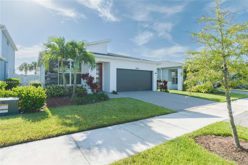 Photo of 10669 SW Gloriana St, Port St Lucie, FL 34987 (MLS # A11854894)