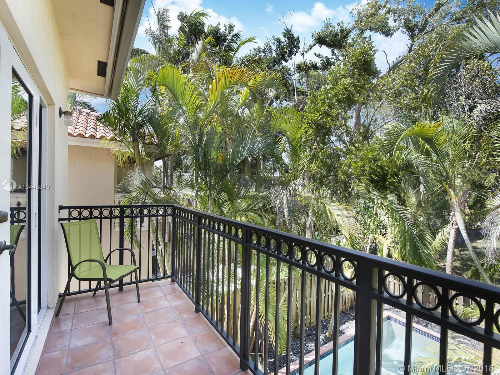 Private two-story Mediterranean masterpiece with gorgeous gleaming travertine flooring. This newer construction townhouse has three bedrooms with generous balconies. Move right into the spacious layout with eat-in kitchen and open family, living and dining areas. Lushly landscaped backyard with swimming pool and plenty of room to entertain.  Totally enclosed with a remote iron gate and one car garage. Just around the corner from the dog and children's park and tennis courts right in the Heart of Center Coconut Grove. Walk to all the Village of Coconut Grove's action. Easy commute to MIA, Downtown Miami and Miami Beach. Live an urban lifestyle in the coolest town in Miami!