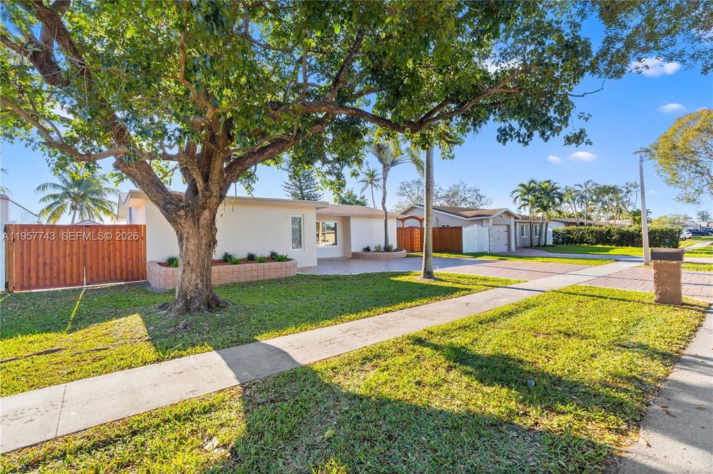 Photo of 1221 NW 96th Ter, Pembroke Pines, FL 33024 (MLS # A11957743)