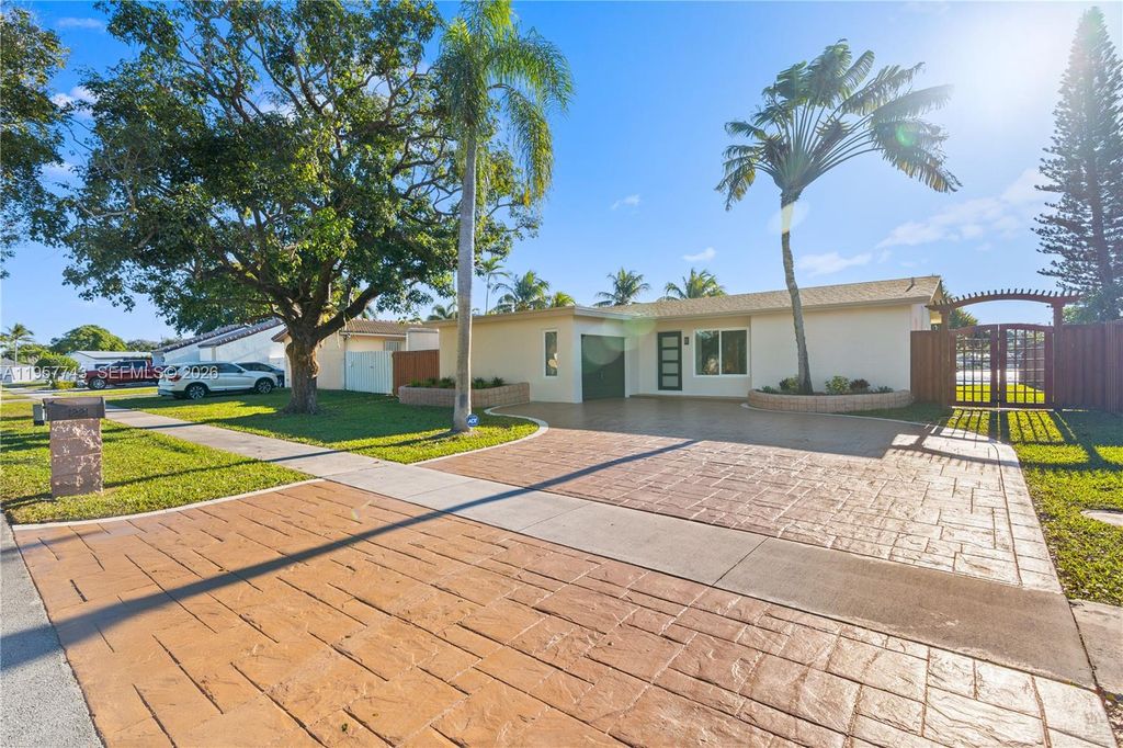 Photo of 1221 NW 96th Ter, Pembroke Pines, FL 33024 (MLS # A11957743)