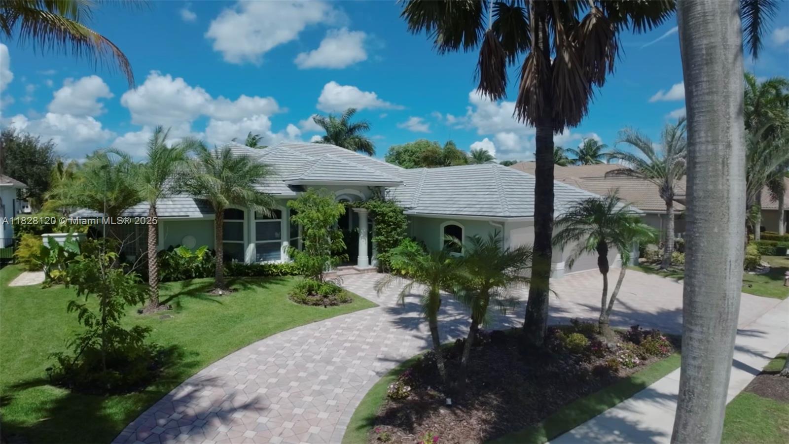 This is a remarkable property on the golf course in Weston Hills Country Club! Home is gorgeous and completely updated with marble flooring, new modern flat tile roof and hurricane impact windows and doors. Home has 5 bedrooms plus office (5th bedrom used as play room) and 5 completely remodeled bathrooms. Beautiful modern kitchen with huge island and large pantry. Outdoor is your own resort living with stunning pool and jacuzzi, chef's outdoor covered kitchen & barbeque and tranquil views of golf course. There is no expense spared with lush landscaping, new AC units, freshly painted inside and outside, circular driveway, kids playground. furniture offered for sale. If you are looking for a move in ready home then you have found it!