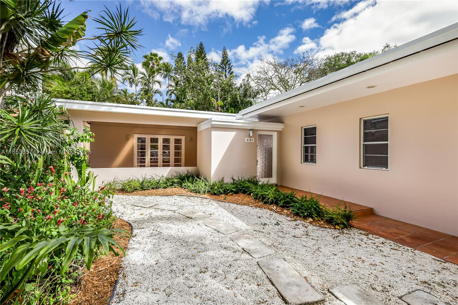 Dreamy gardens and winding paths create a magical backdrop for this charming Coconut Grove home. Blissfully adjourned with palm trees and extensive greenery, interior features two bedrooms, two bathrooms, cozy kitchen, sun-drenched living spaces, original tile floors and classic architectural details. The French doors throughout open to the lush tranquil grounds. Located just minutes from downtown, airport, UM, Coral Gables, Key Biscayne, Miami Beach, and adjacent to a small neighborhood park. One look at this home and you’ll understand why this South Grove neighborhood is known as “Utopia”.