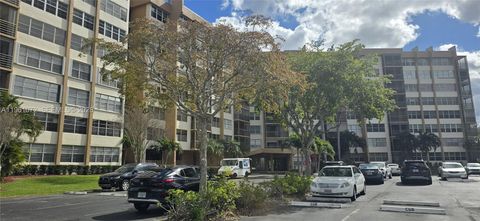 Photo of 1200 Saint Charles Pl #207, Pembroke Pines, FL 33026 (MLS # A11961072)