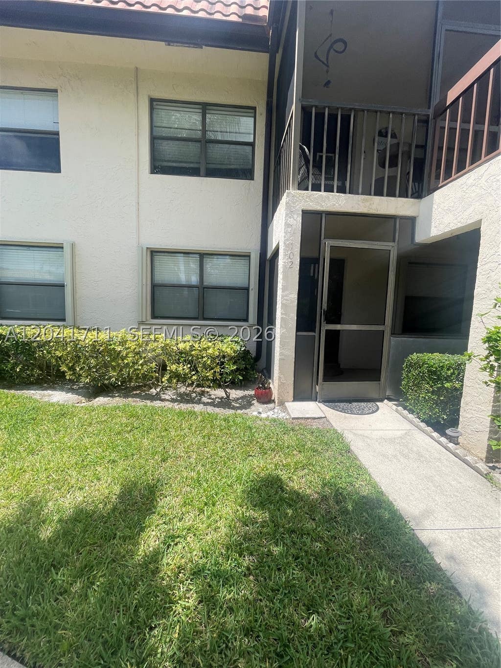 Photo of 7250 Golf Colony Ct #102, Lake Worth, FL 33467 (MLS # A12041711)