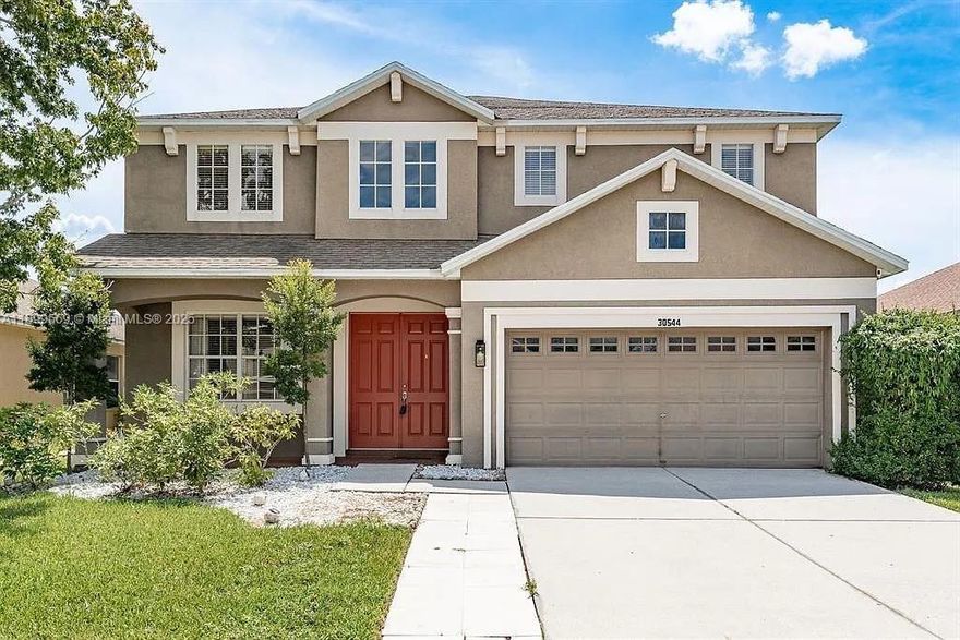 Discover this beautifully maintained 4-bedroom, 2.5-bath residence in the sought-after Palm Cove community. With timeless design, high ceilings,wood floors that set an inviting tone. To your left, enjoy a formal living and dining area complete with stainless steel appliances, granite countertops, center island, walk-in pantry.Upstairs, the primary suite spans the full length of the home and includes two walk-in closets and a spa-inspired bathroom with dual vanities, soaking tub, glass-enclosed shower, and private water closet. Covered patio, private vinyl-fenced yard, spacious lawn, community pool and clubhouse,Conveniently located near I-75, top-rated schools.Rent Special $2,500 for the 1st month, $2,550 for 2nd, $2,600 for 3rd, and $2,650 from the 4th through the 12th month.