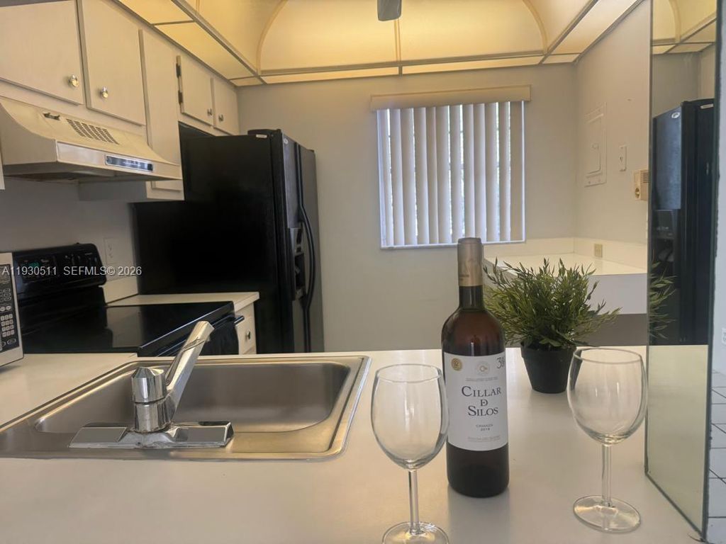 Photo of 9330 Lagoon Pl #302, Davie, FL 33324 (MLS # A11930511)