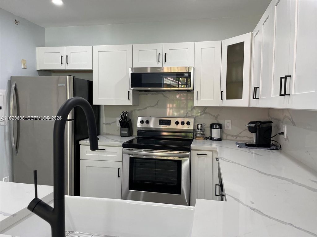 Photo of 2031 Renaissance Blvd #101, Miramar, FL 33025 (MLS # A11928633)